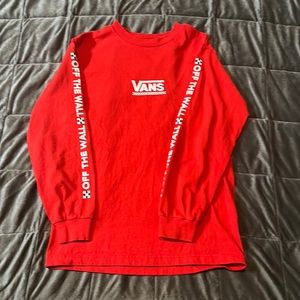Vans long sleeve t-shirt. Size small. Minor detail. Base color red.